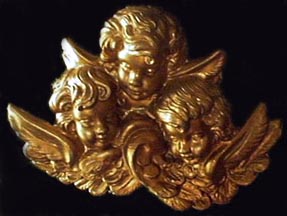 three gold angel busts